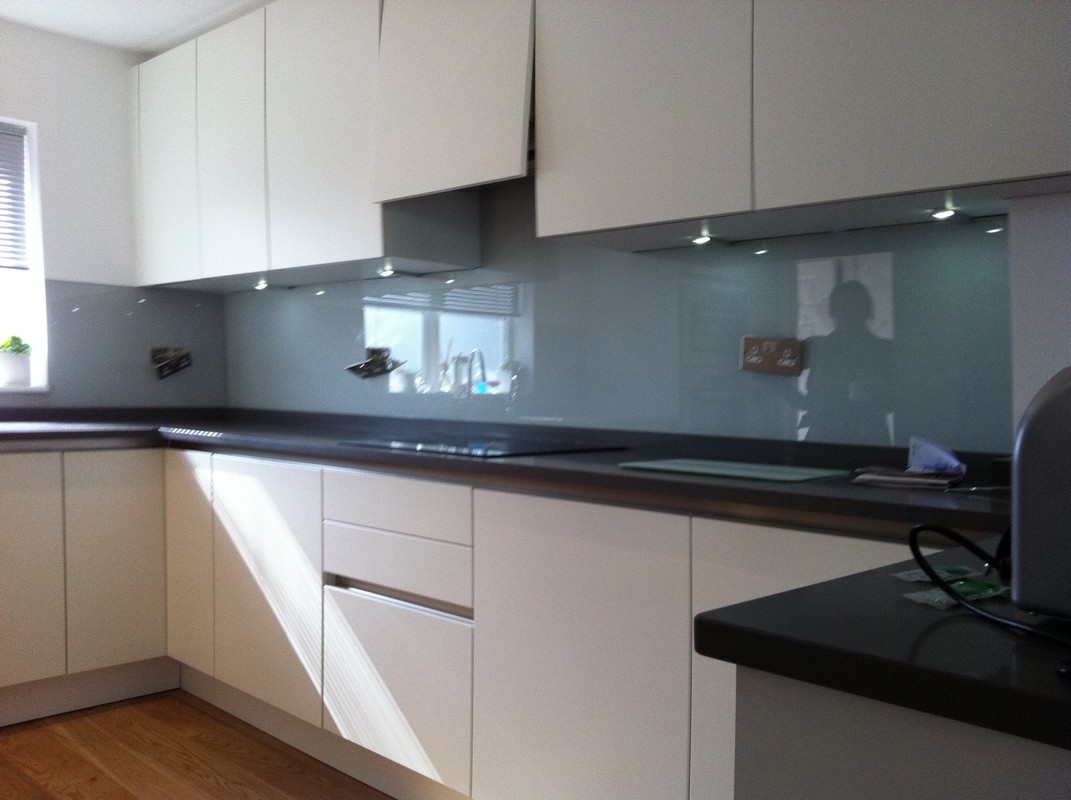 Grey glass kitchen splashback with LED lighting in Slough